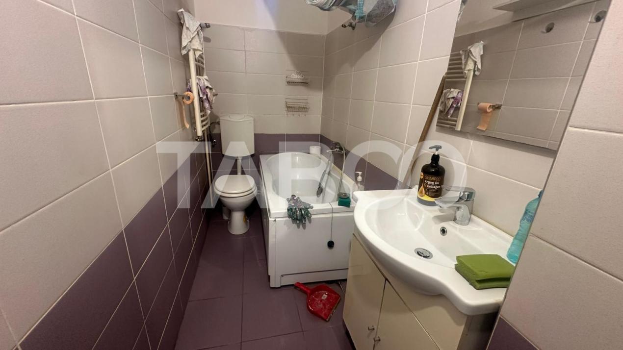 Apartament 105 mpu cu curte  la casa 3 camere zona Tiglari Sibiu 