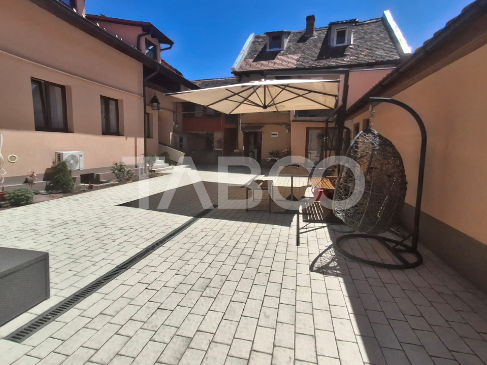Apartament 2 camere 44 mp utili ETAJ 1 curte amenajata central Sibiu