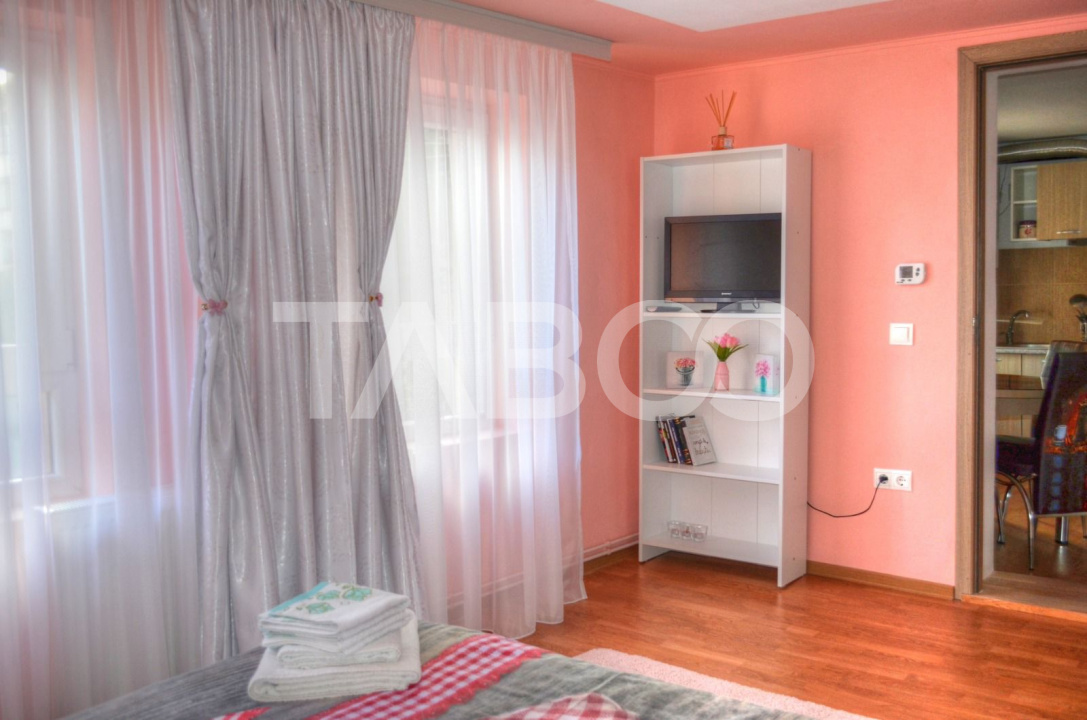 Apartament 2 camere 44 mp utili ETAJ 1 curte amenajata central Sibiu