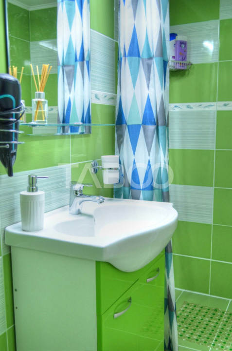 Apartament 2 camere 44 mp utili ETAJ 1 curte amenajata central Sibiu