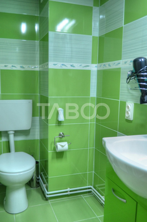 Apartament 2 camere 44 mp utili ETAJ 1 curte amenajata central Sibiu