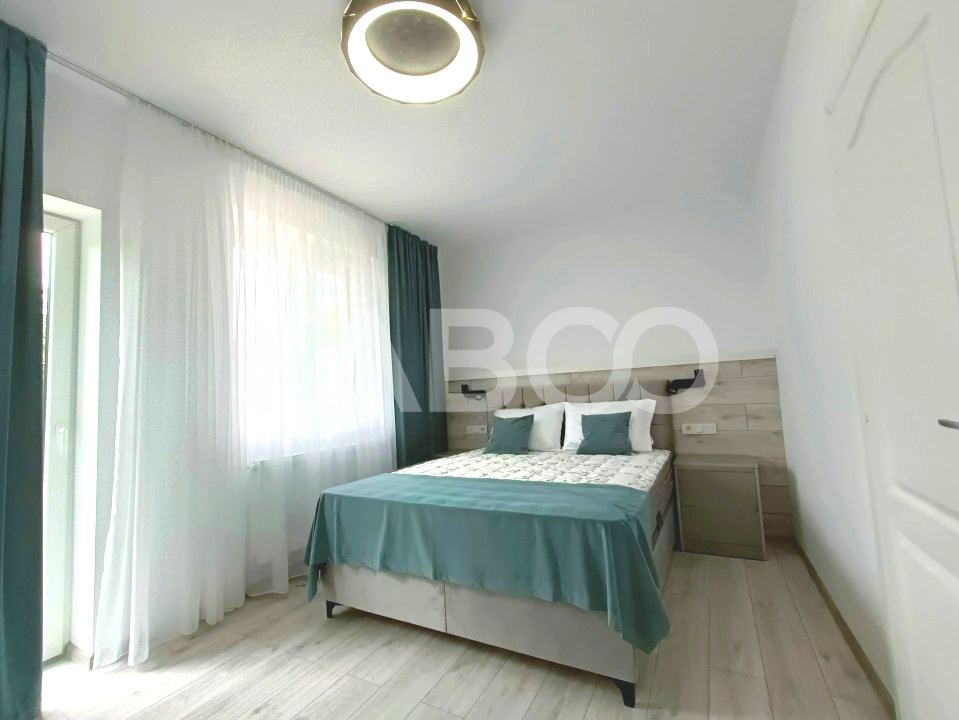 Apartament 2 camere - mobilat modern - curte proprie cu filigorie