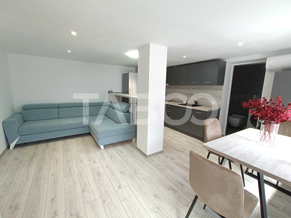 Apartament 2 camere - mobilat modern - curte proprie cu filigorie