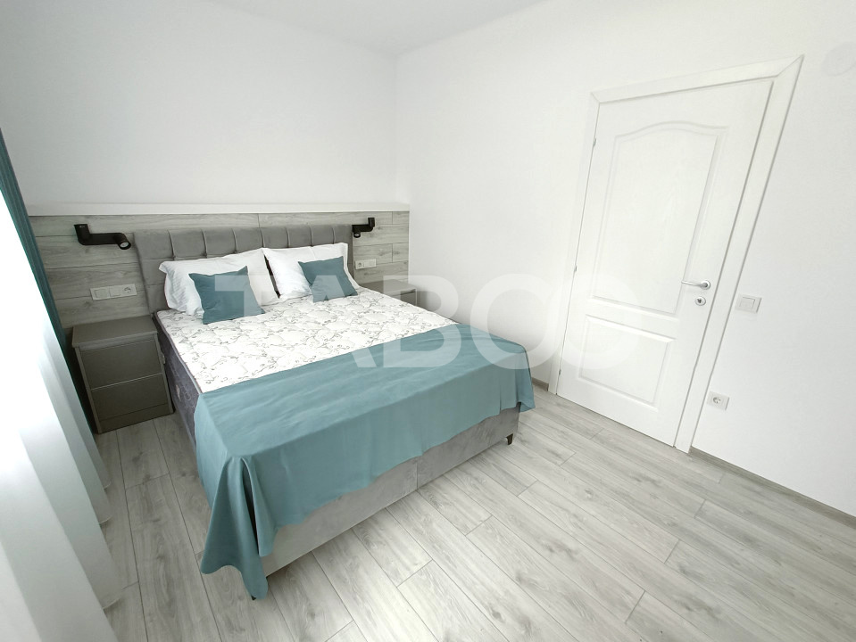 Apartament 2 camere - mobilat modern - curte proprie cu filigorie