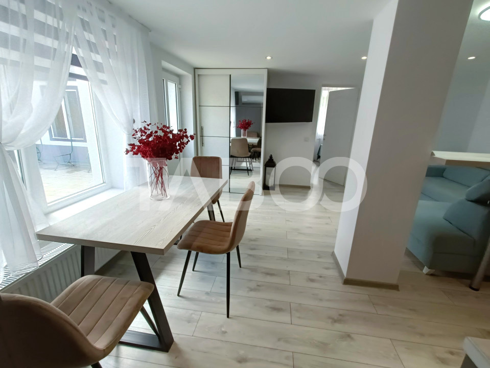 Apartament 2 camere - mobilat modern - curte proprie cu filigorie