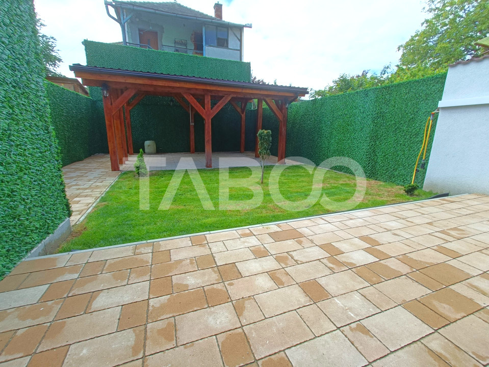 Apartament 2 camere - mobilat modern - curte proprie cu filigorie