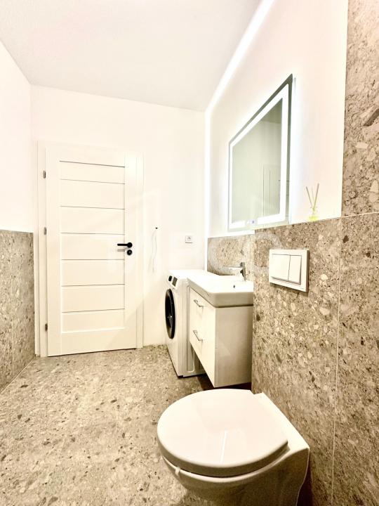 Apartament 2 camere parter 54 mp utili balcon loc de parcare Cristian