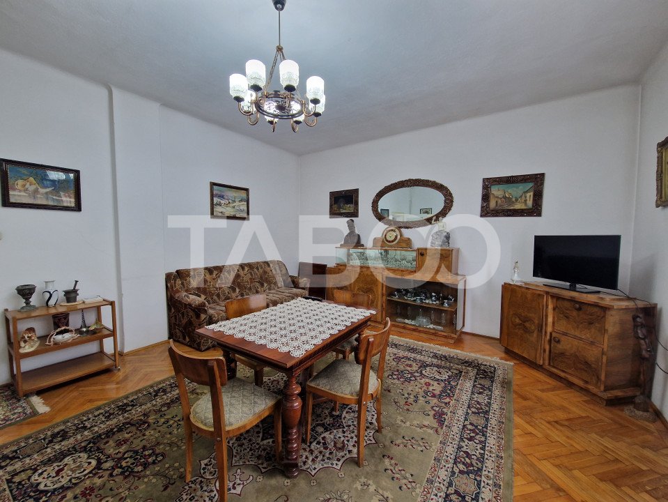 Apartament 4 camere spatiu comercial garaj si pivnita contral Sibiu