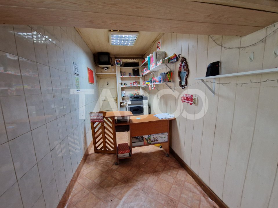 Apartament 4 camere spatiu comercial garaj si pivnita contral Sibiu