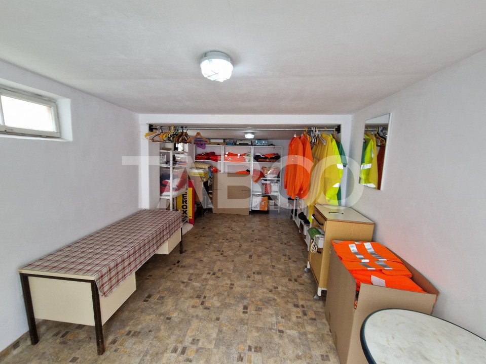 Apartament 4 camere spatiu comercial garaj si pivnita contral Sibiu