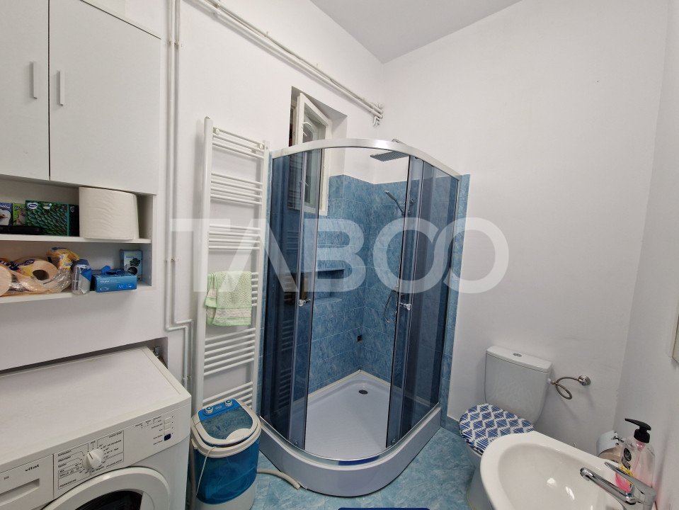 Apartament 4 camere spatiu comercial garaj si pivnita contral Sibiu