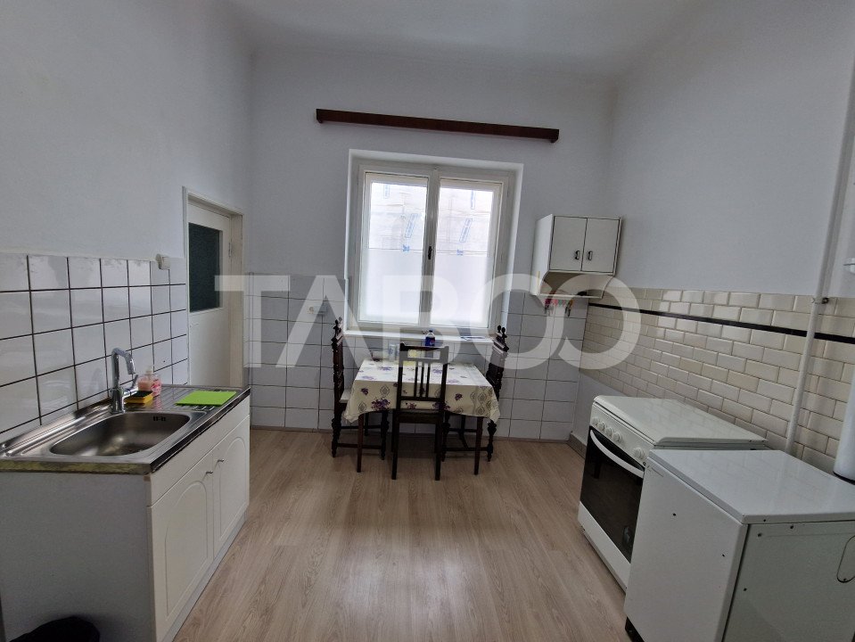 Apartament 4 camere spatiu comercial garaj si pivnita contral Sibiu