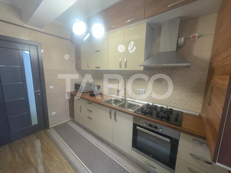 Apartament complet mobilat utilat 2 camere garaj 2 balcoane parter