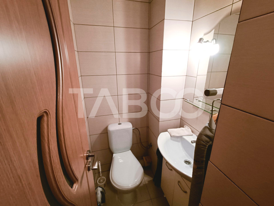 Apartament cu 3 camere 2 bai 63 mp utili etaj 1 in Sibiu zona Turnisor