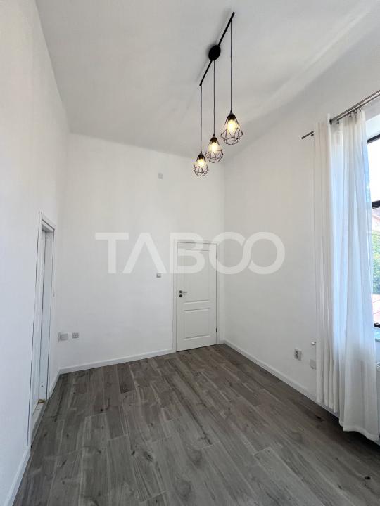 Apartament cu 3 camere si terasa de 14 mp de vanzare in zona Centrala