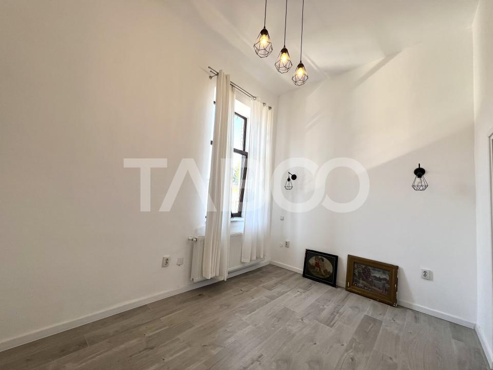 Apartament cu 3 camere si terasa de 14 mp de vanzare in zona Centrala