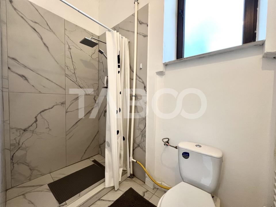 Apartament cu 3 camere si terasa de 14 mp de vanzare in zona Centrala