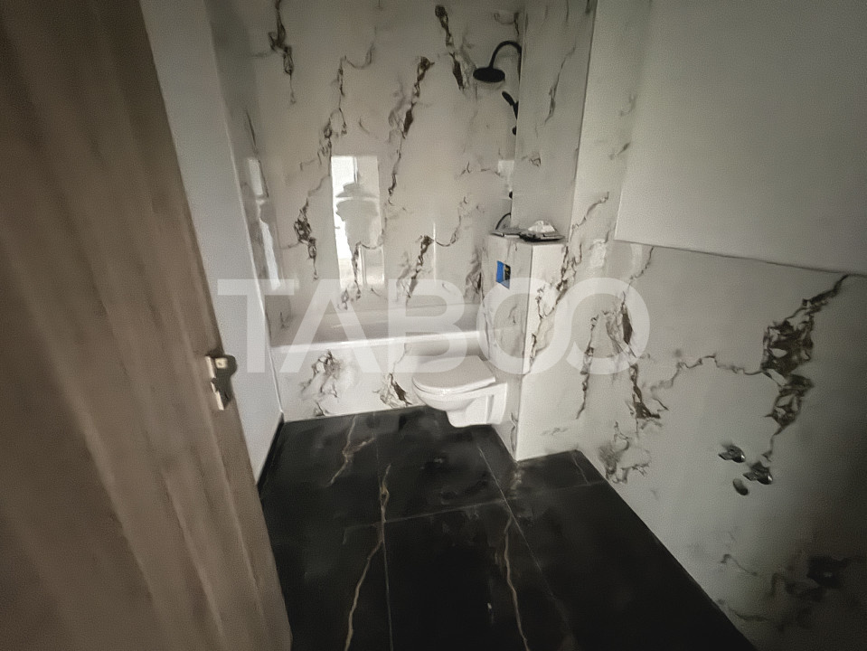 Apartament cu 4 camere 2 bai 84 mpu balcon 18 mp loc parcare Sibiu