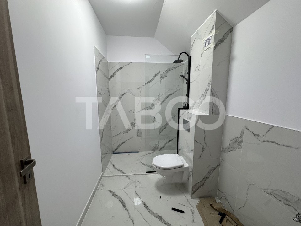 Apartament cu 4 camere 2 bai 84 mpu balcon 18 mp si loc parcare inclus