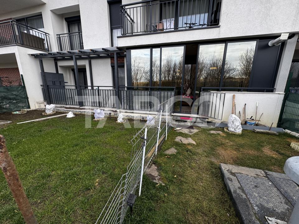 Apartament cu gradina 63 mp 3 camere 2 parcari si boxa Turnisor Sibiu