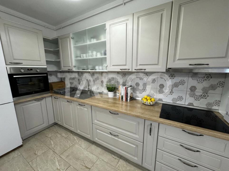 Apartament cu gradina 63 mp 3 camere 2 parcari si boxa Turnisor Sibiu