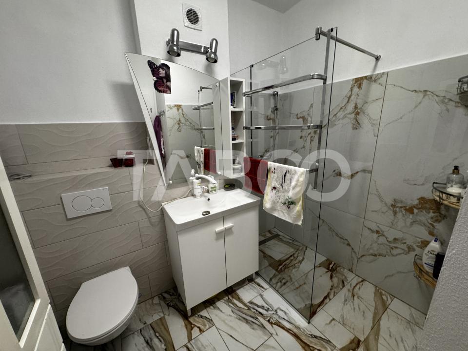 Apartament cu gradina 63 mp 3 camere 2 parcari si boxa Turnisor Sibiu