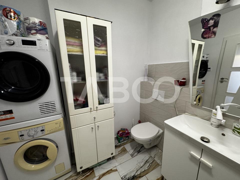 Apartament cu gradina 63 mp 3 camere 2 parcari si boxa Turnisor Sibiu