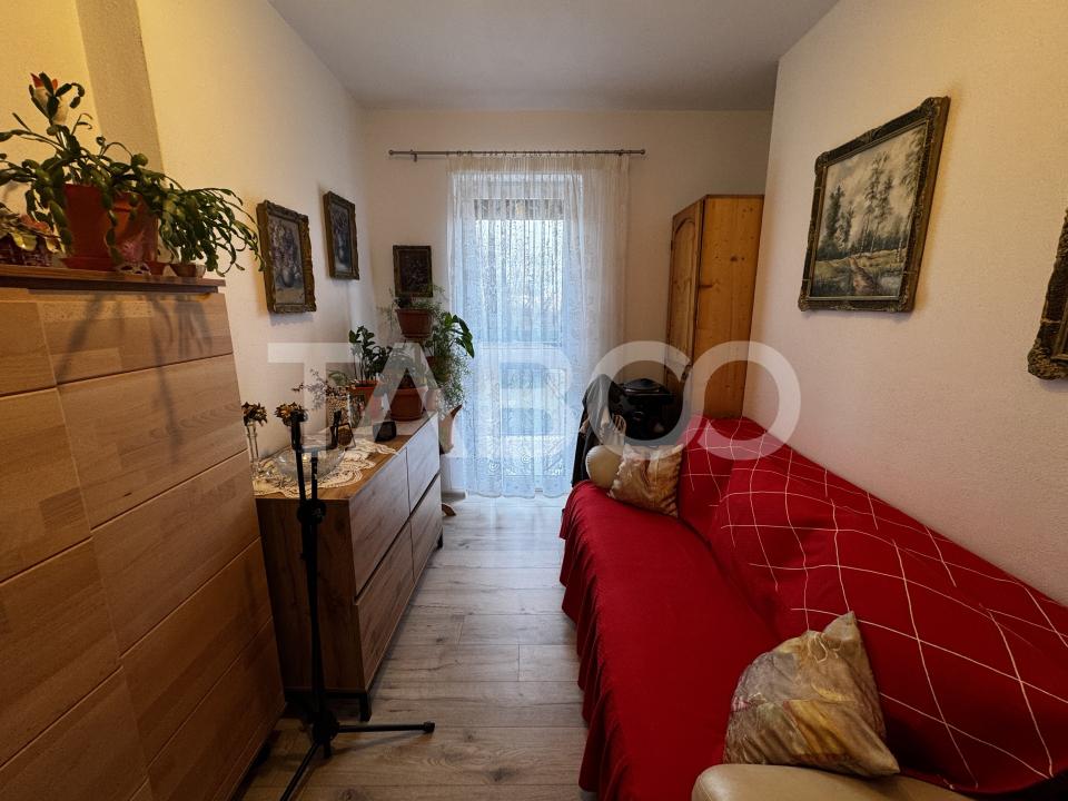 Apartament cu gradina de 63 mp 3 camere 2 parcari boxa Turnisor Sibiu