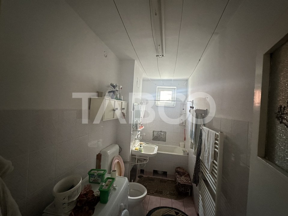  Apartament cu potential de investitie 3 camere 70 mpu etaj parter 