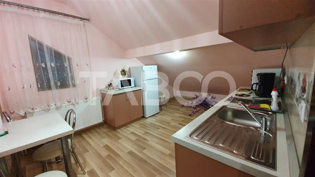 Apartament de inchiriat  56 mpu 2 camere mansarda in vila Selimbar
