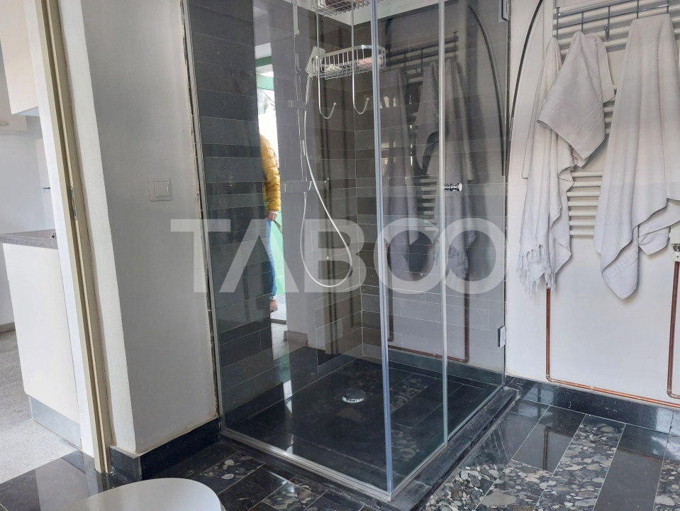 Apartament de vanzare 105 mp 3 camere curte 340 mp in acte Cisnadie