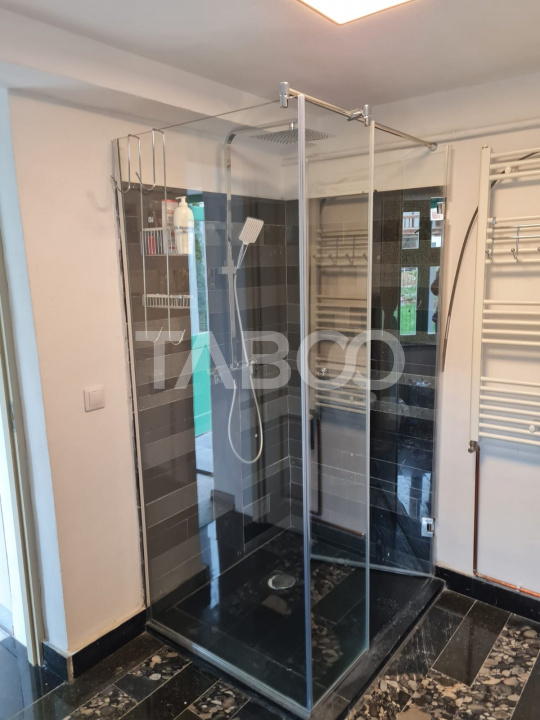 Apartament de vanzare 105 mp 3 camere curte 340 mp in acte Cisnadie