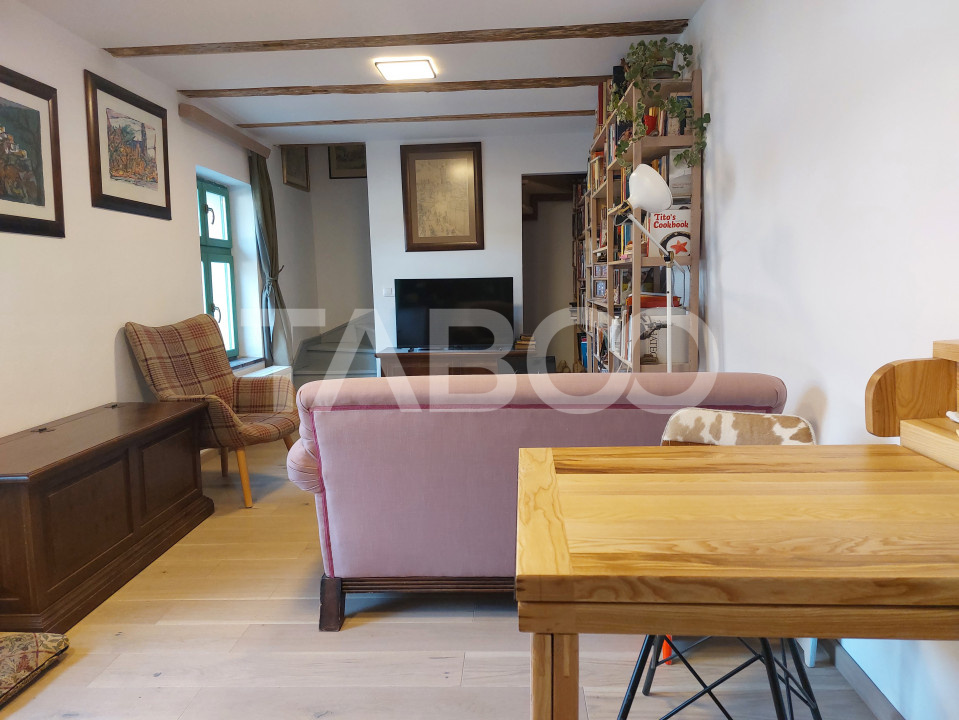 Apartament de vanzare 105 mp 3 camere curte 340 mp in acte Cisnadie