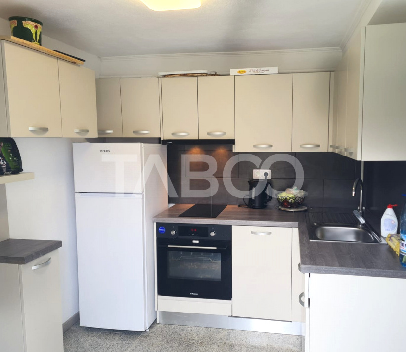 Apartament de vanzare 105 mp 3 camere curte 340 mp in acte Cisnadie