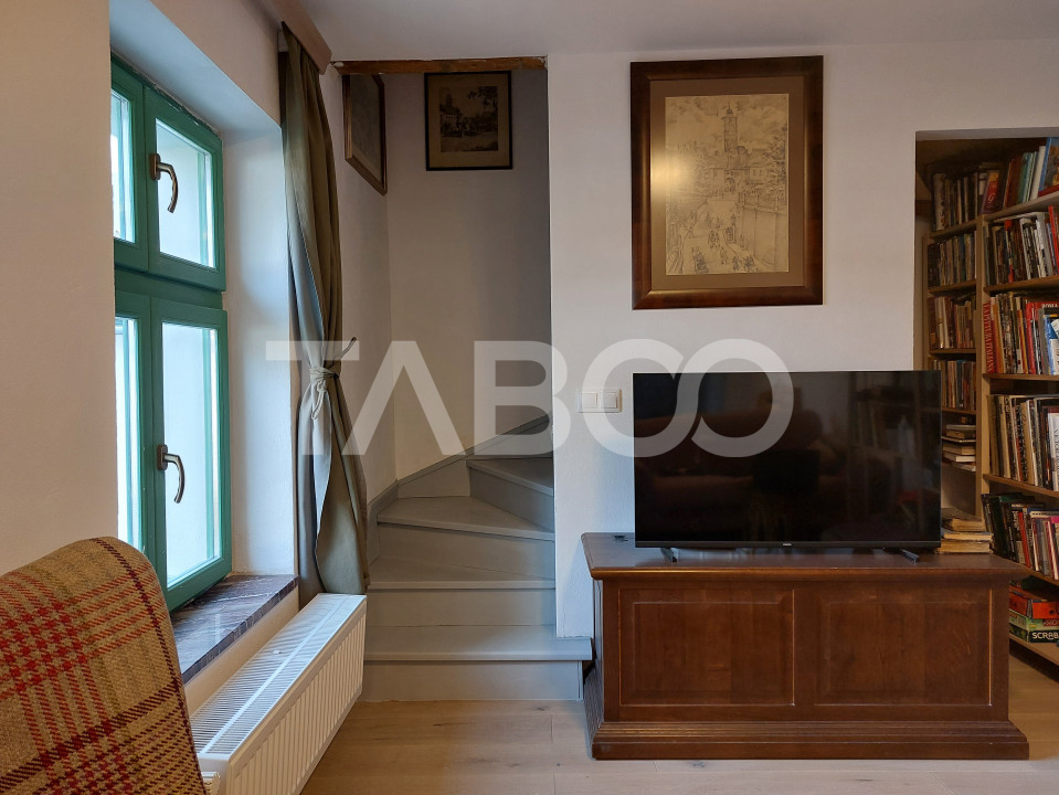 Apartament de vanzare 105 mp 3 camere curte 340 mp in acte Cisnadie