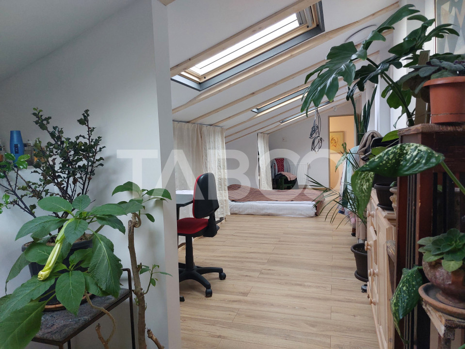 Apartament de vanzare 105 mp 3 camere curte 340 mp in acte Cisnadie