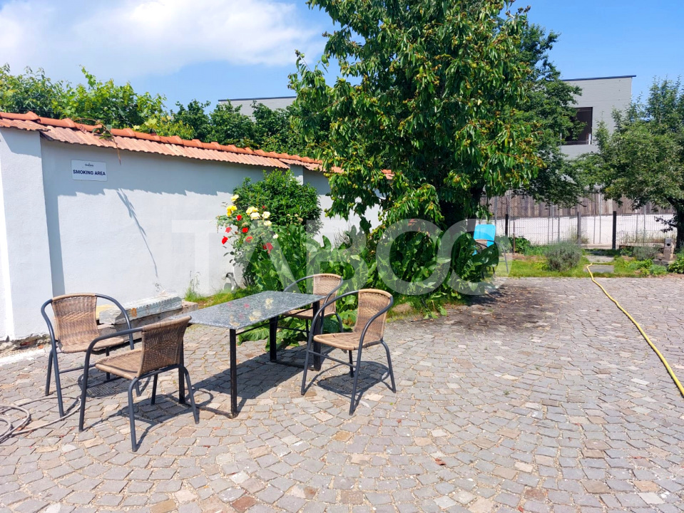 Apartament de vanzare 105 mp 3 camere curte 340 mp in acte Cisnadie