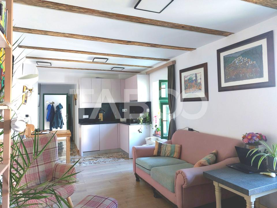 Apartament de vanzare 105 mp 3 camere curte 340 mp in acte Cisnadie