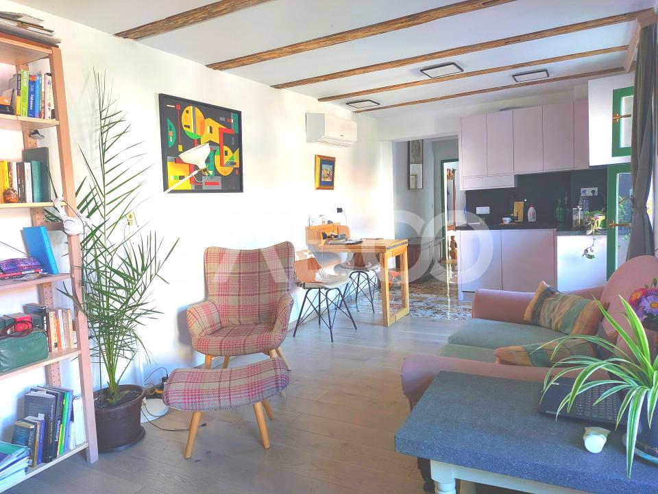 Apartament de vanzare 105 mp 3 camere curte 340 mp in acte Cisnadie