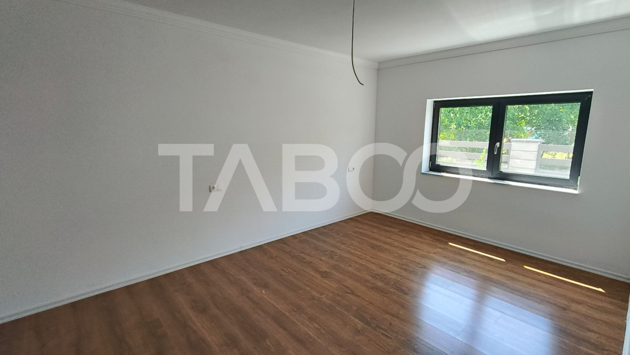 Apartament de vanzare cu 2 camere si curte proprie in bloc nou