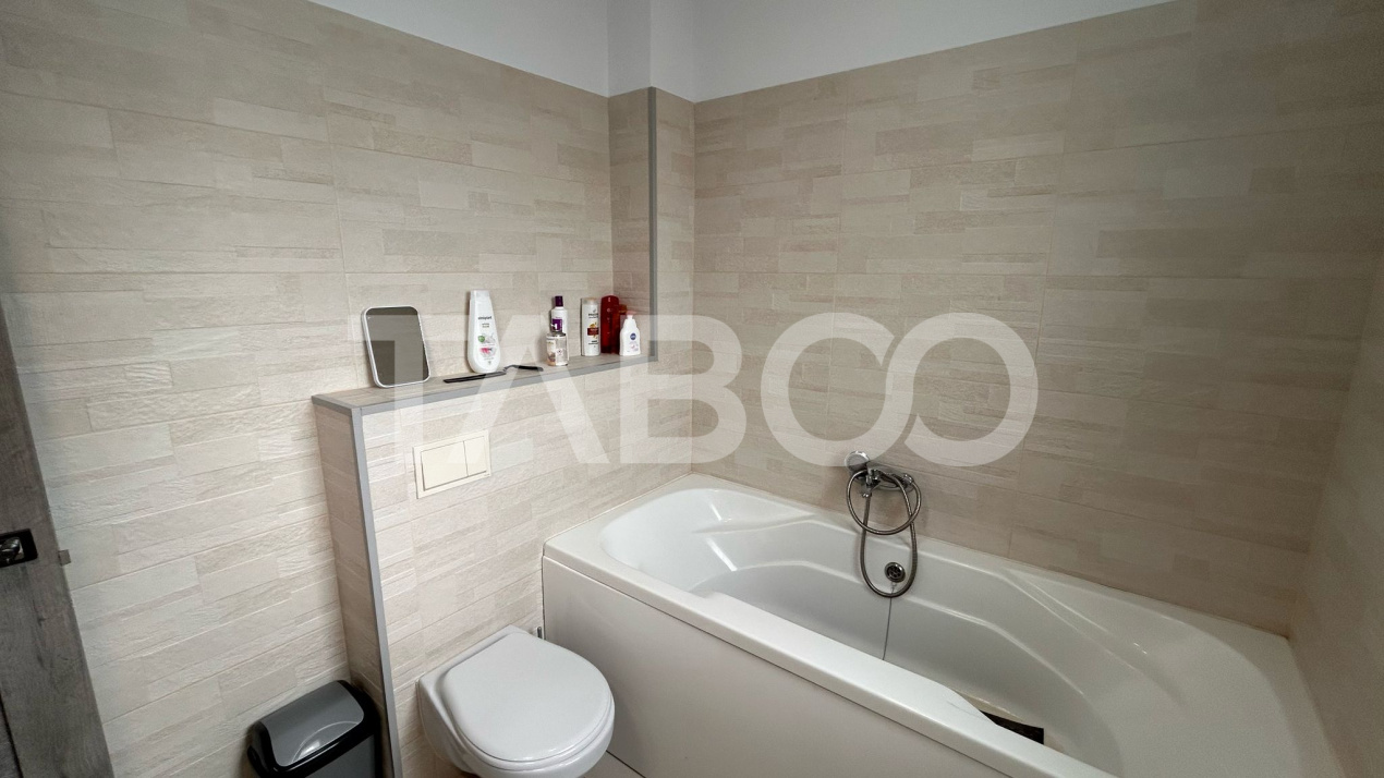 Apartament de vanzare cu 3 camere 2 bai 2 locuri de parcare in Sibiu