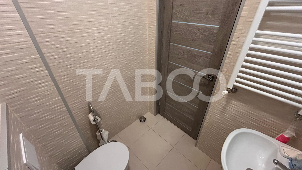 Apartament de vanzare cu 3 camere 2 bai 2 locuri de parcare in Sibiu