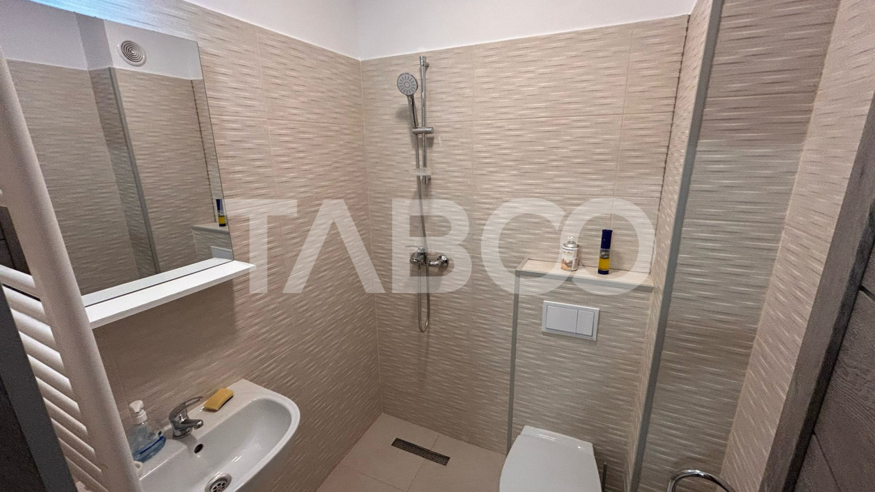 Apartament de vanzare cu 3 camere 2 bai 2 locuri de parcare in Sibiu