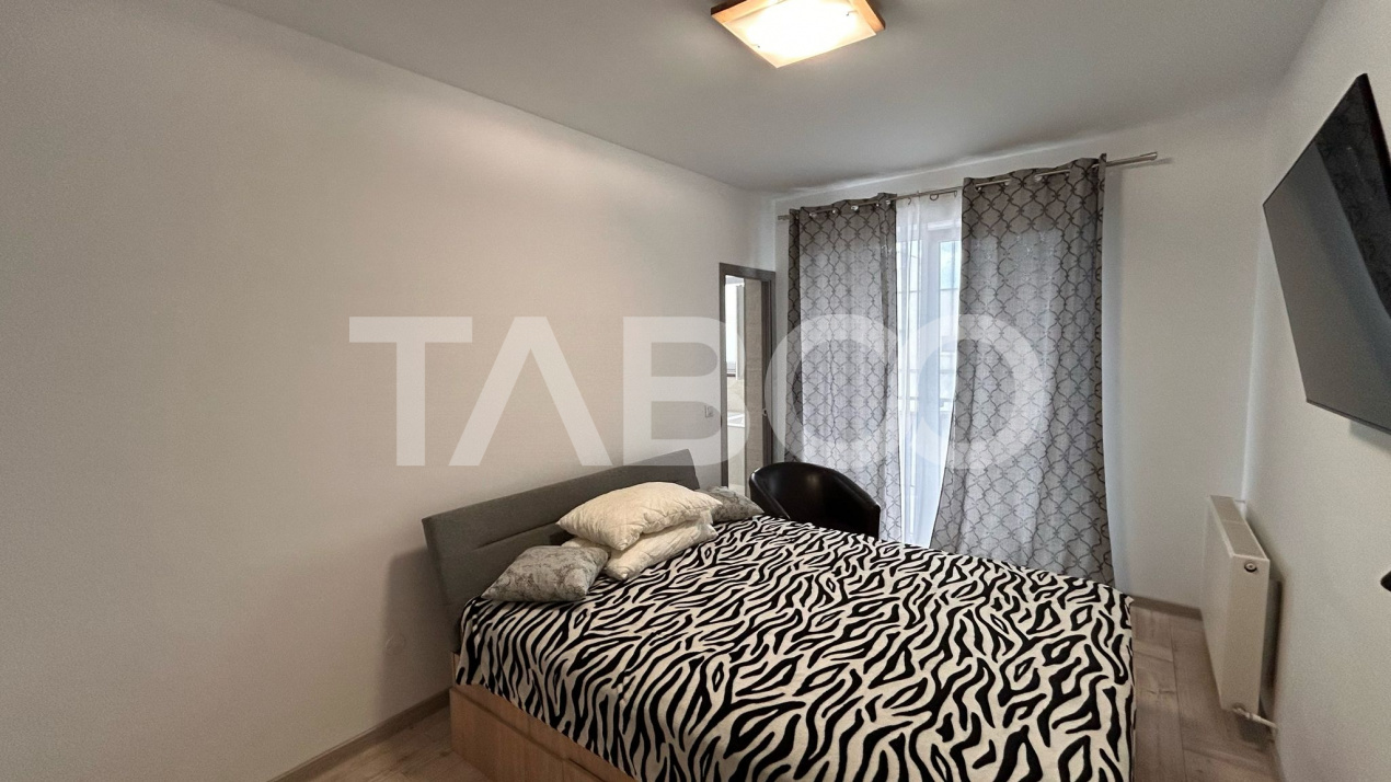 Apartament de vanzare cu 3 camere 2 bai 2 locuri de parcare in Sibiu