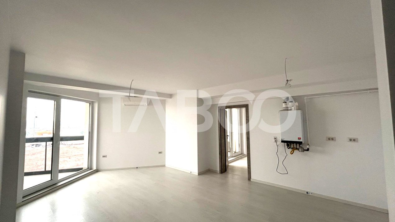 Apartament de vanzare cu 3 camere 2 balcoane 2 bai loc parcare Sibiu
