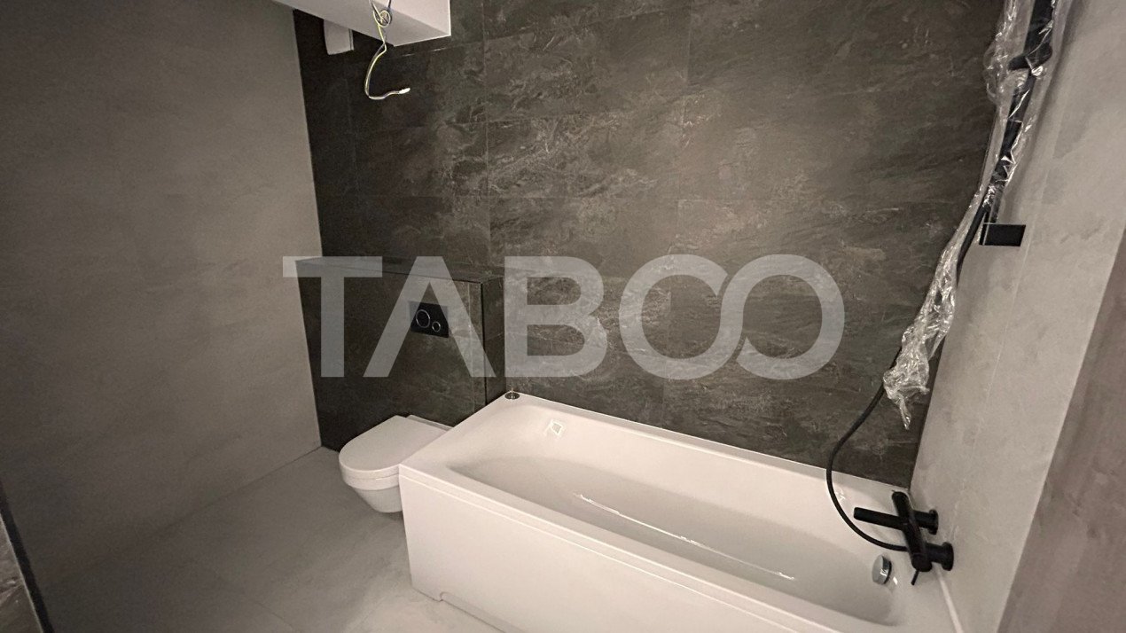 Apartament de vanzare cu 3 camere 2 balcoane 2 bai loc parcare Sibiu