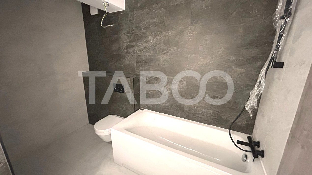Apartament de vanzare cu 3 camere 2 balcoane 2 bai loc parcare Sibiu