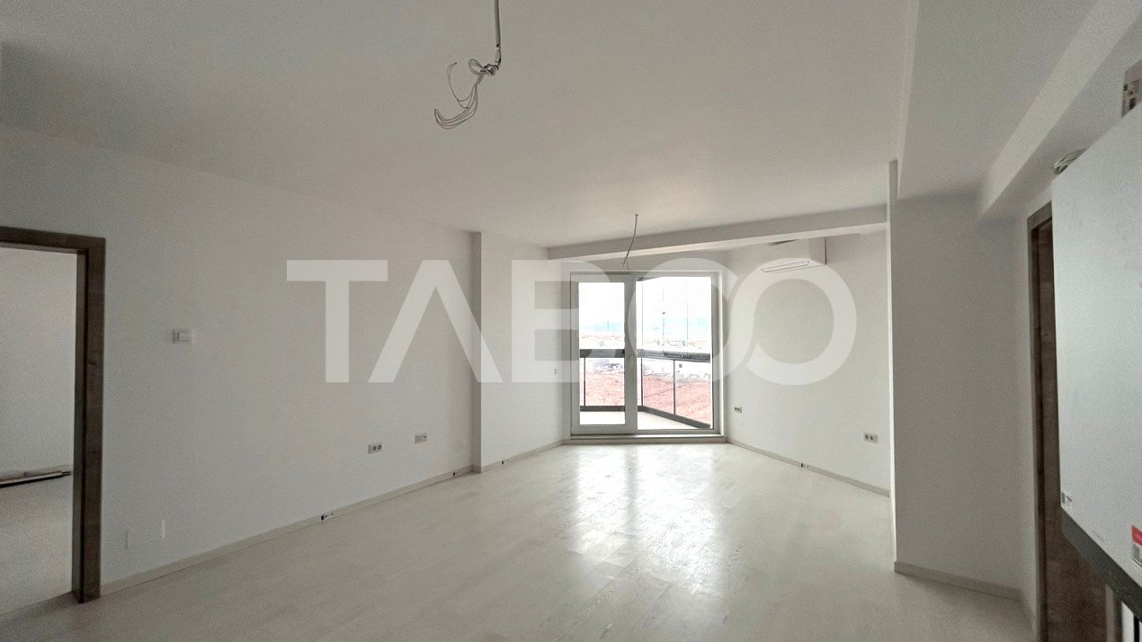 Apartament de vanzare cu 3 camere 2 balcoane 2 bai loc parcare Sibiu