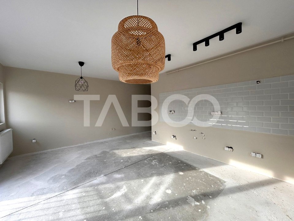 Apartament de vanzare cu 3 camere etaj intermediar cu loc de parcare