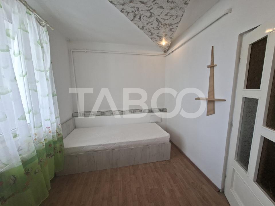 Apartament de vanzare cu 3 camere si balcon Mihai Viteazul numarul 23